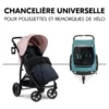 Chancelière Hauck noire en situation ; poussette et remorque non incluses